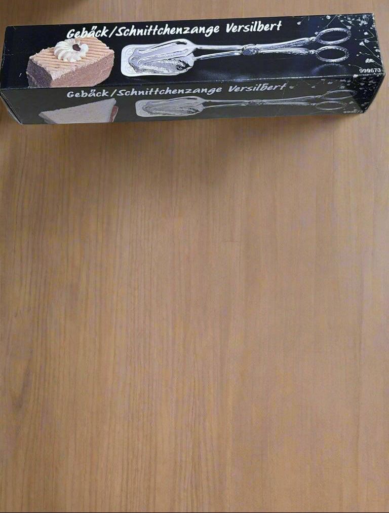 Versilberte Gebäckzange