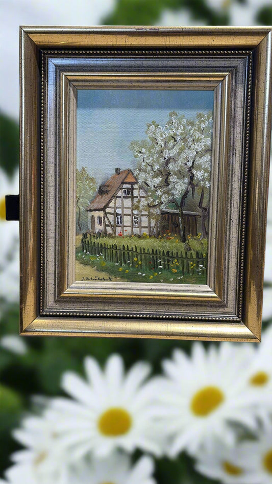 Gerahmtes Ölgemälde mit blühendem Baum im Vordergrund