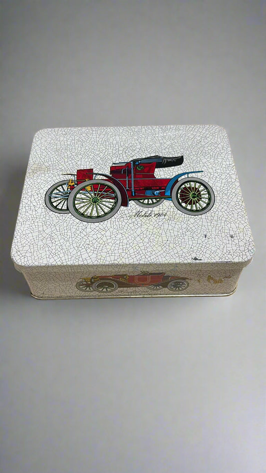 Vintage-Blechdose mit historischen Automobilen